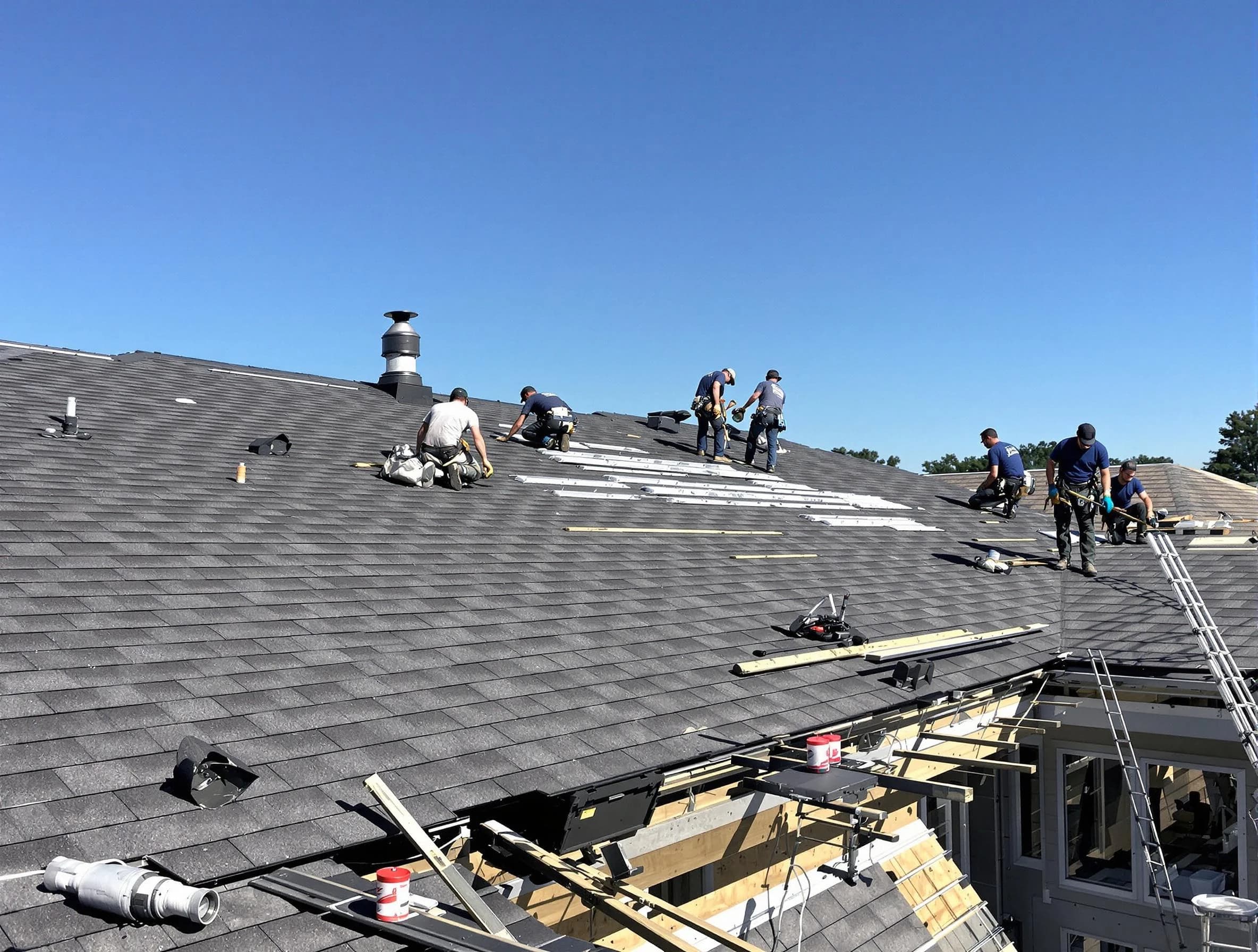 Stow Roofing Company experts performing roof installation in Stow, OH