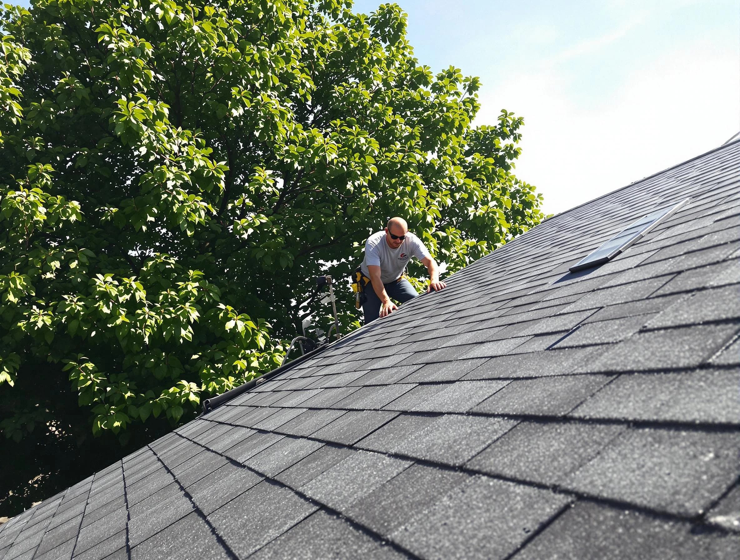 Certified roofers from Stow Roofing Company working in Stow, OH